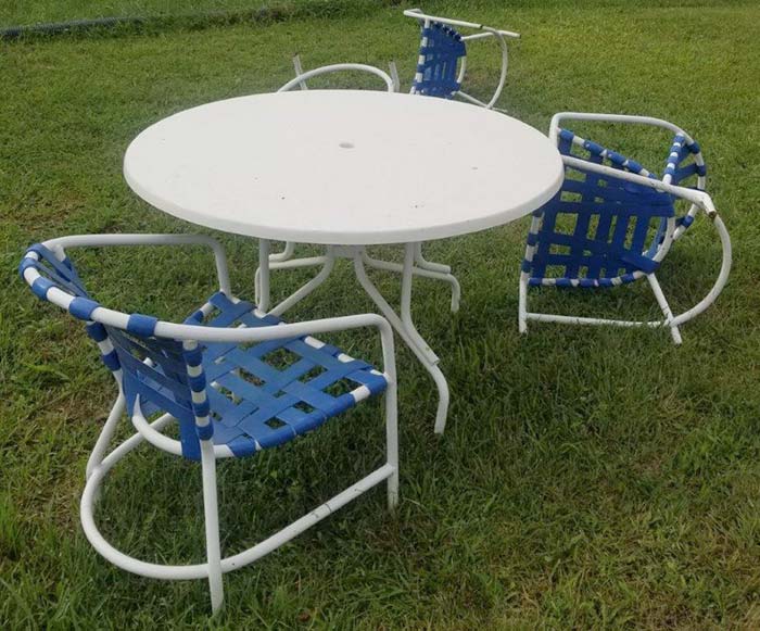 Outdoor table and chairs blown over from the wind