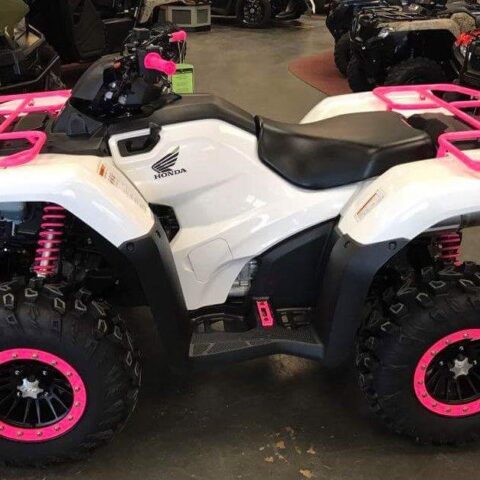 Photo Of A 4-wheeler With Pink Powder-coating On Bars