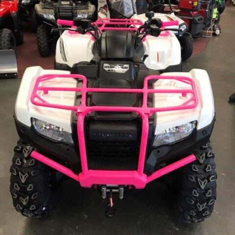 Photo Of A 4-wheeler With Pink Powder-coating On Bars