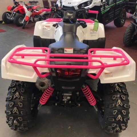 Photo Of A 4-wheeler With Pink Powder-coating On Bars