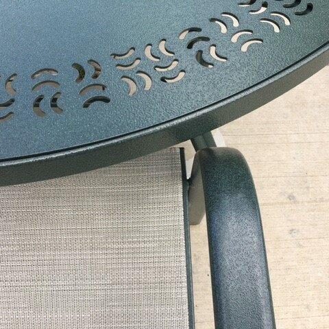 Close Up Of Green Table Top After Refinishing On Patio With Chairs